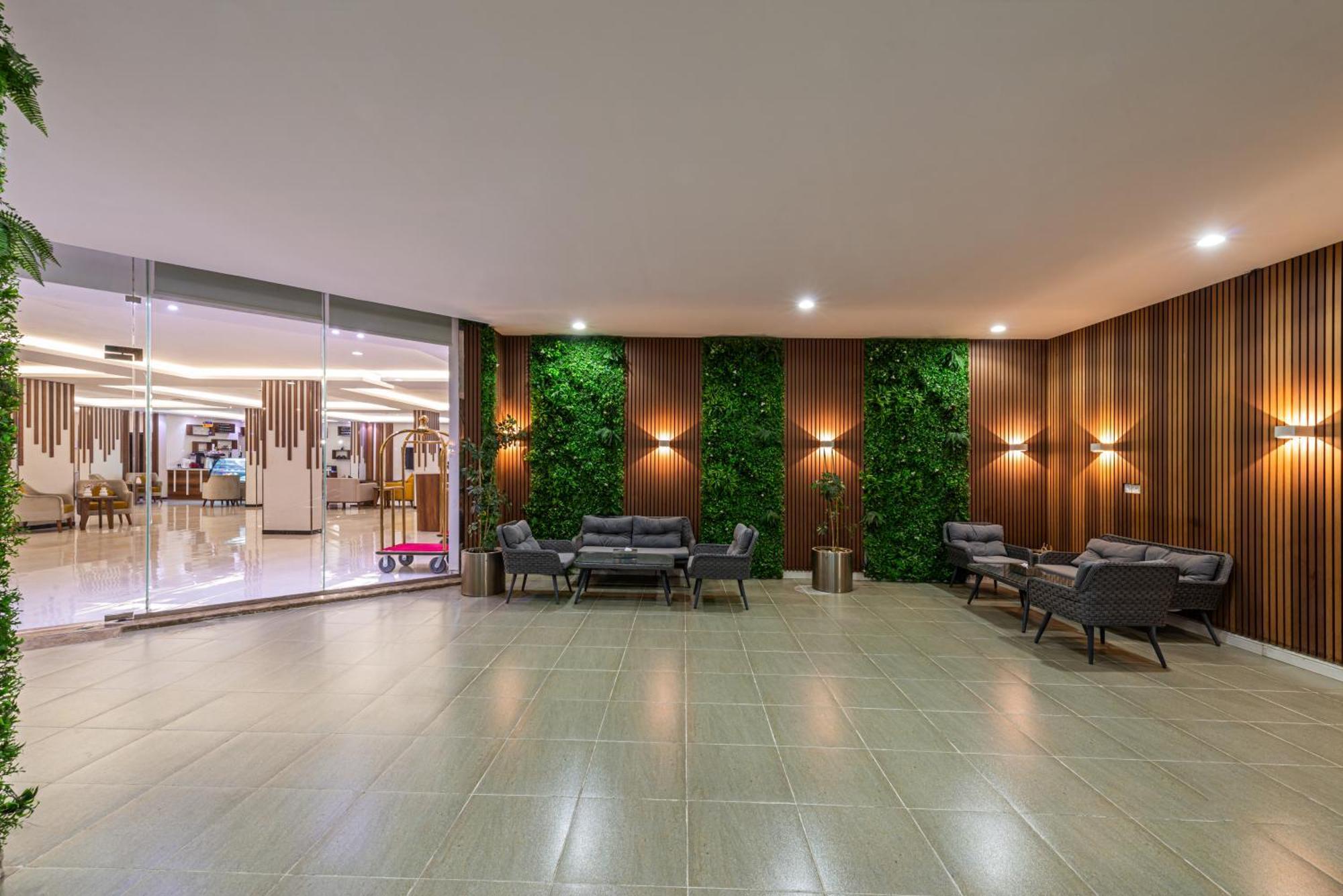 The Palace Hotel Suites Chamis Muschait Exterior foto