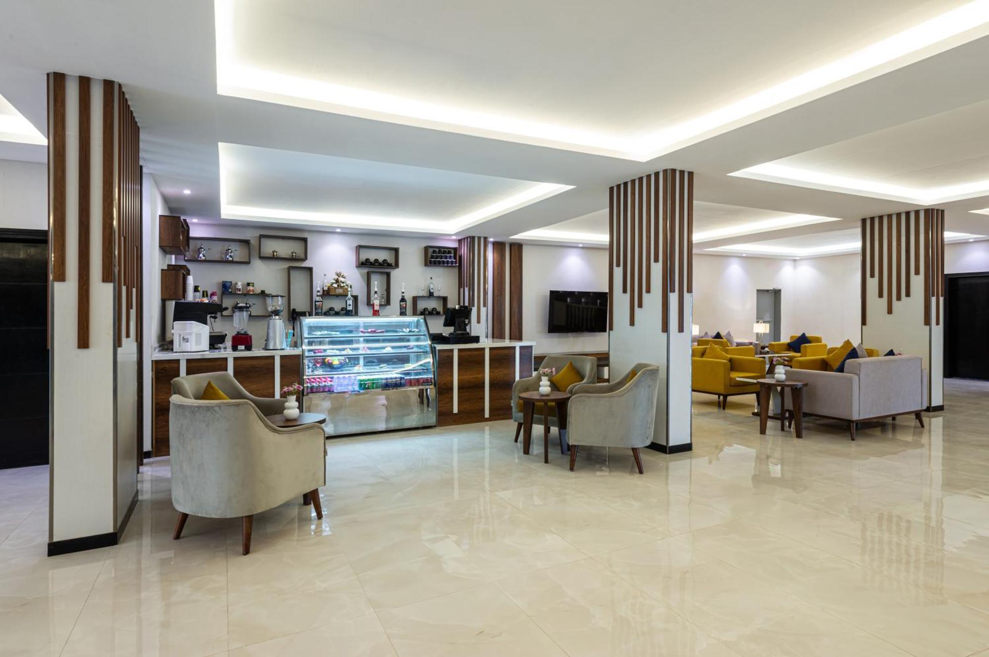 The Palace Hotel Suites Chamis Muschait Exterior foto